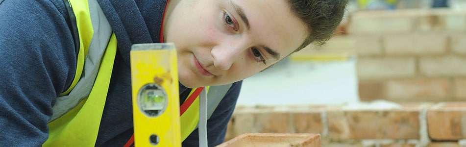 Student using spirit level
